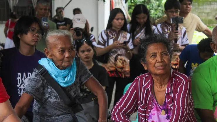 Aeta elders and youth gathered at a community meeting opposing Pax Silica